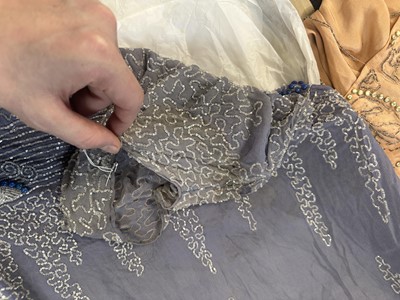 Lot 759 - A group of beaded flapper dresses in poor condition, 1920s