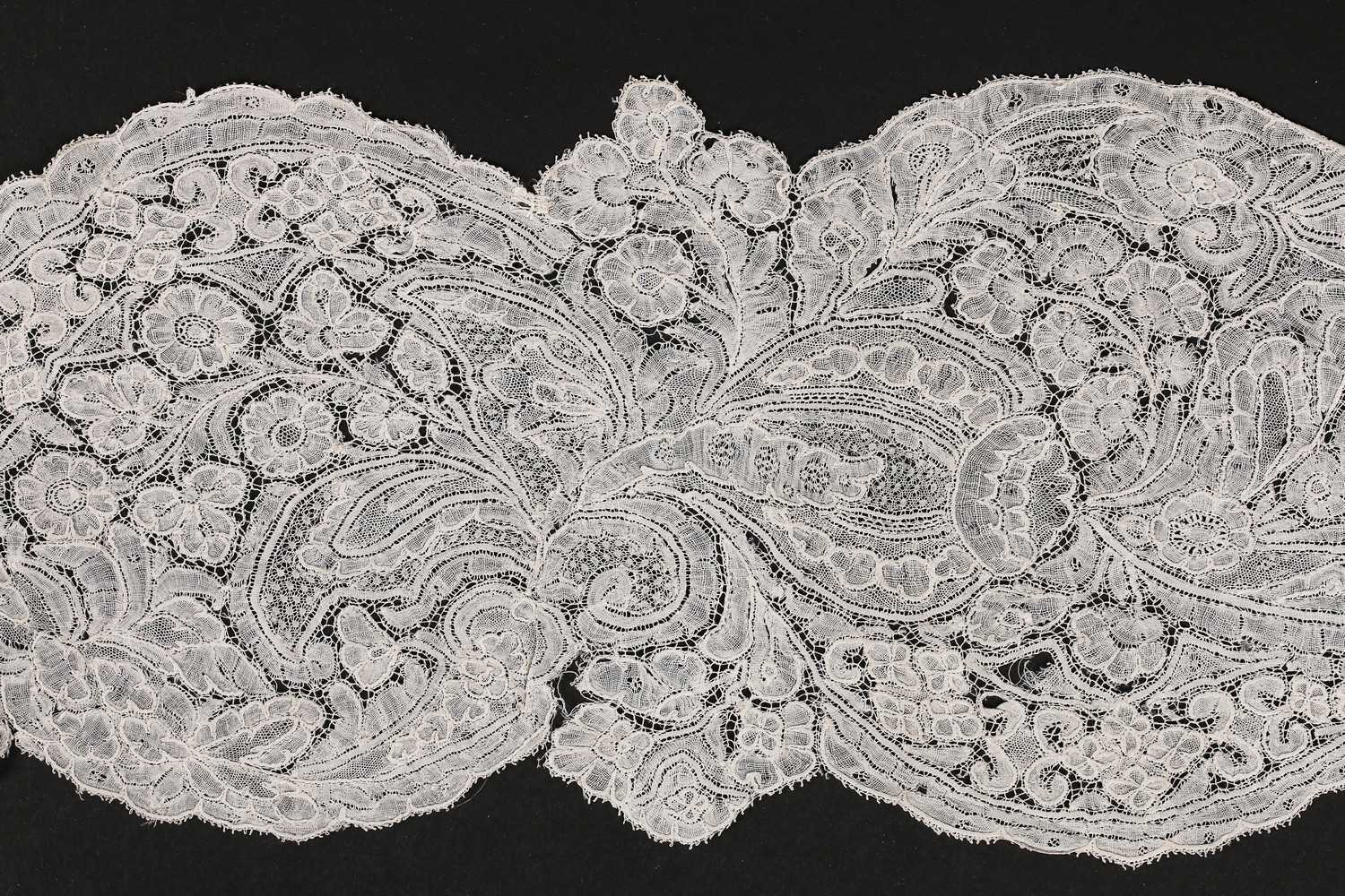 Lot 483 - A Brussels lappet, circa 1730, delicately...