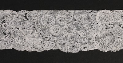 Lot 483 - A Brussels lappet, circa 1730, delicately...