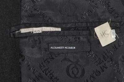 Lot 26 - An Alexander McQueen black Melton wool coat, probably 'Joan' collection Autumn-Winter 1998-99