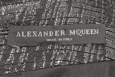 Lot 372 - An Alexander McQueen silver lamé dress, circa 2009