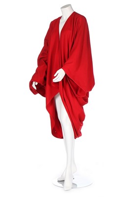 Lot 166 - An Issey Miyake red wool cocoon coat,...