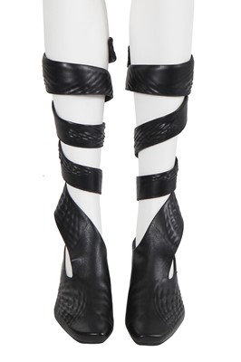 Lot 266 - A pair of Zaha Hadid for Lacoste black leather shoes, 2009