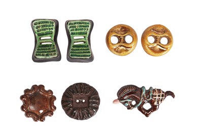 Lot 84 - A group of ceramic buttons attributed to Jean Clément, 1940s