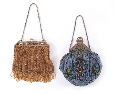 Lot 87 - A group of beaded and mesh evening bags,...