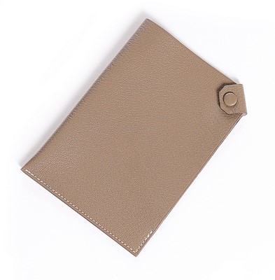 Lot 96 - An Hermès ebony calfskin men's 'Hebdo'...