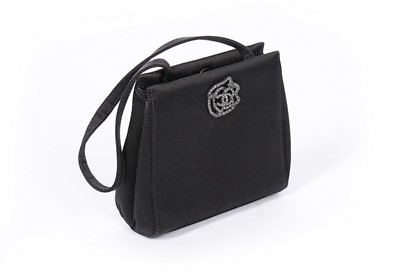 Lot 122 - A Chanel black satin evening bag with matching...
