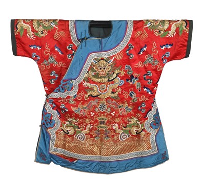 Lot 912 - An embroidered orange satin mangao, Chinese, circa 1920