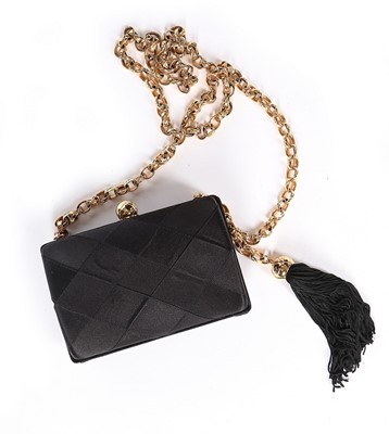 Lot 126 - A Chanel black satin minaudière, probably...