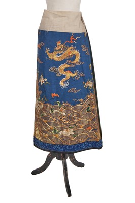 Lot 921 - An embroidered mid-blue silk altar front (altered to form a skirt panel), Chinese, late 19th century