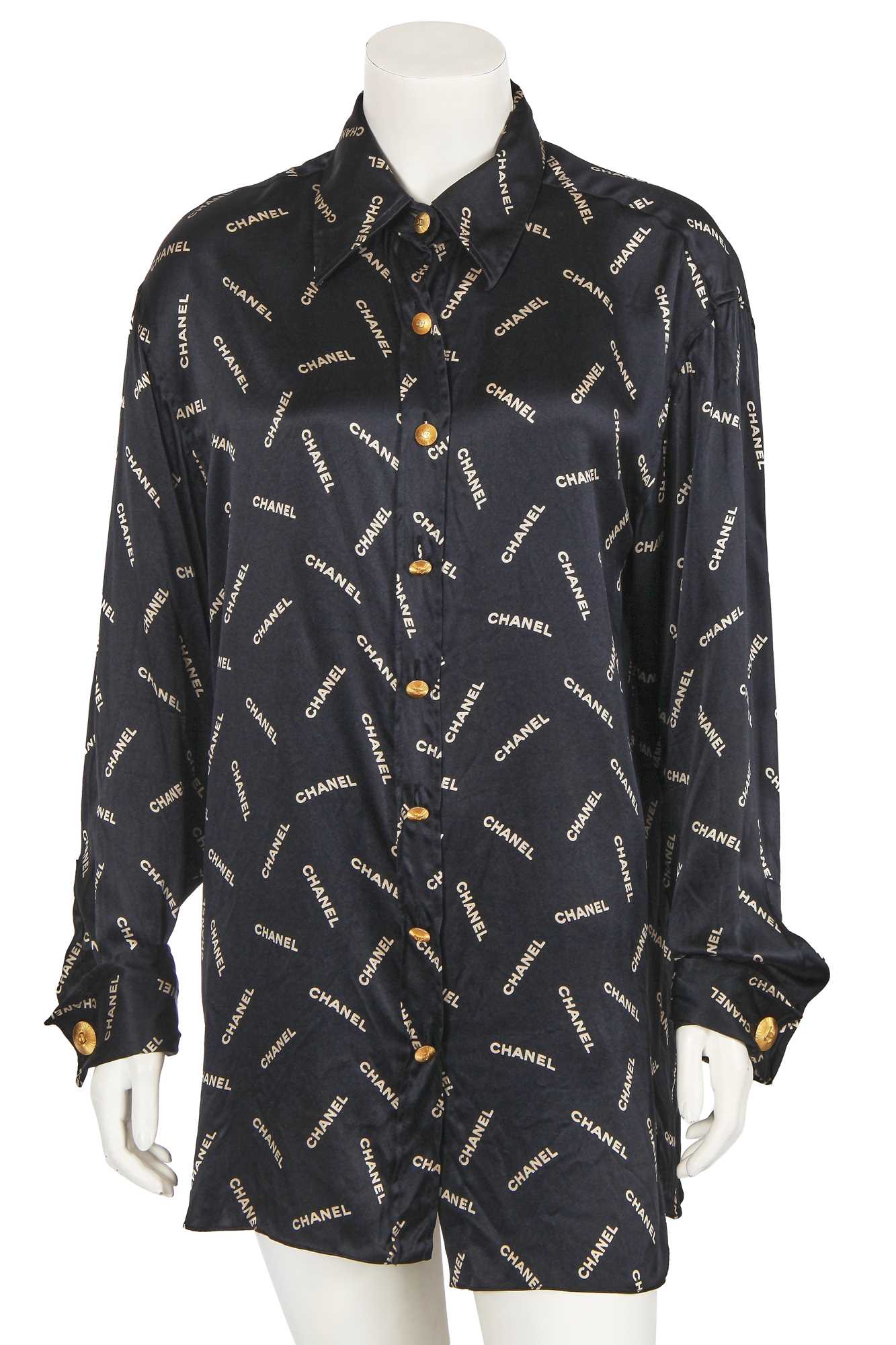 Lot 238 - A Chanel by Karl Lagerfeld printed silk blouse and matching gilt cufflinks, circa 1988