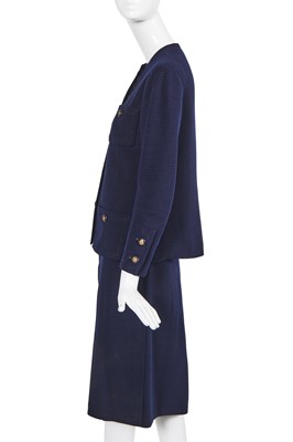 Lot 58 - A Chanel haute couture navy blue jersey suit, circa 1973