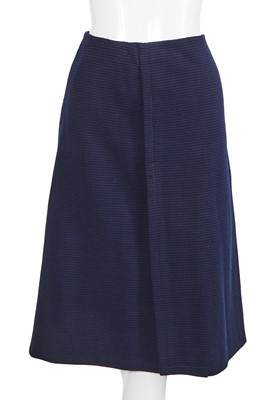 Lot 58 - A Chanel haute couture navy blue jersey suit, circa 1973