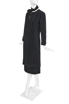 Lot 60 - A Gabrielle Chanel haute couture black wool and silk ensemble, circa 1969