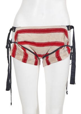 Lot 346 - A Vivienne Westwood ecru and red Harvard striped kitchen towel ensemble, circa 2005