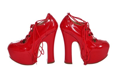 Lot 179 - A pair of Vivienne Westwood red patent leather elevated ghillie heels, 2000s