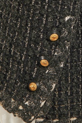 Lot 35 - A Chanel by Karl Lagerfeld grey and black tweed jacket, 1990s
