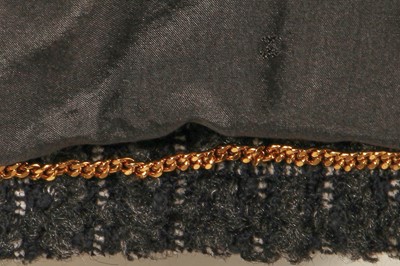 Lot 35 - A Chanel by Karl Lagerfeld grey and black tweed jacket, 1990s
