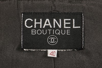 Lot 35 - A Chanel by Karl Lagerfeld grey and black tweed jacket, 1990s