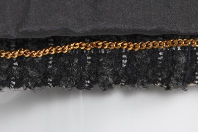 Lot 35 - A Chanel by Karl Lagerfeld grey and black tweed jacket, 1990s