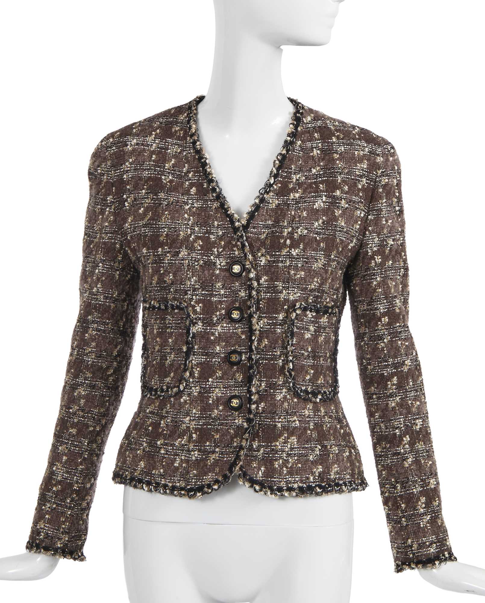 Lot 24 - A Chanel by Karl Lagerfeld grey and gold tweed jacket, late 1990s