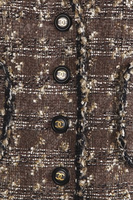 Lot 24 - A Chanel by Karl Lagerfeld grey and gold tweed jacket, late 1990s
