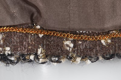 Lot 24 - A Chanel by Karl Lagerfeld grey and gold tweed jacket, late 1990s