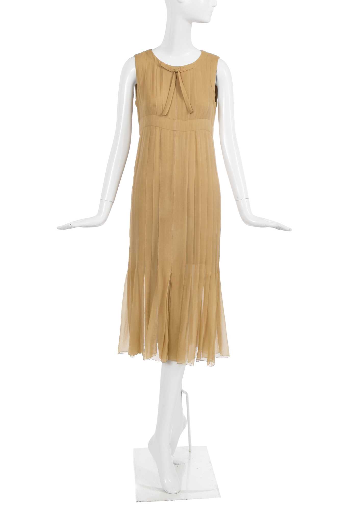 Lot 36 - A Chanel haute couture by Karl Lagerfeld buff silk chiffon dress, Spring-Summer 1993