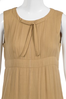 Lot 36 - A Chanel haute couture by Karl Lagerfeld buff silk chiffon dress, Spring-Summer 1993