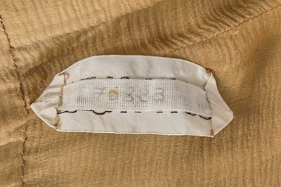 Lot 36 - A Chanel haute couture by Karl Lagerfeld buff silk chiffon dress, Spring-Summer 1993