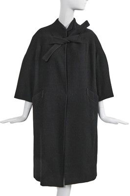 Lot 473 - A Pierre Balmain haute couture black wool coat, circa 1960