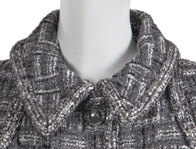 Lot 8 - A Chanel by Karl Lagerfeld grey tweed jacket, 'Chanel Airspace' collection, Autumn-Winter 2017-18