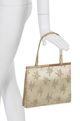 Lot 95 - A Cartier London gold silk brocade handbag, 1962