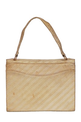 Lot 95 - A Cartier London gold silk brocade handbag, 1962