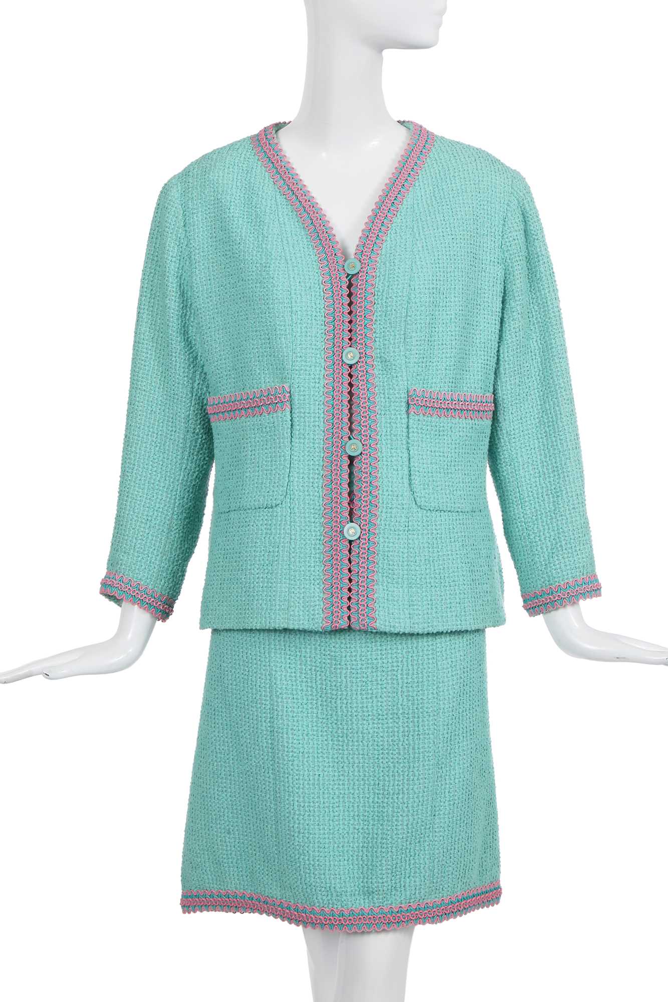 Lot 34 - A Chanel by Karl Lagerfeld turquoise cotton-wool blend bouclé suit, 'The New Corset' collection, Spring-Summer 1994