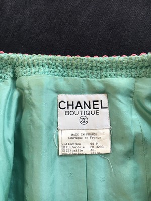 Lot 34 - A Chanel by Karl Lagerfeld turquoise cotton-wool blend bouclé suit, 'The New Corset' collection, Spring-Summer 1994