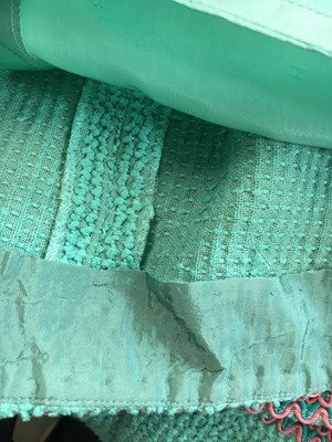 Lot 34 - A Chanel by Karl Lagerfeld turquoise cotton-wool blend bouclé suit, 'The New Corset' collection, Spring-Summer 1994