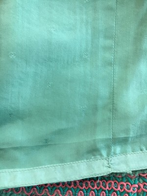 Lot 34 - A Chanel by Karl Lagerfeld turquoise cotton-wool blend bouclé suit, 'The New Corset' collection, Spring-Summer 1994