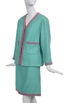 Lot 34 - A Chanel by Karl Lagerfeld turquoise cotton-wool blend bouclé suit, 'The New Corset' collection, Spring-Summer 1994