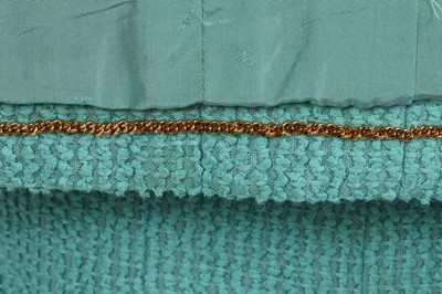 Lot 34 - A Chanel by Karl Lagerfeld turquoise cotton-wool blend bouclé suit, 'The New Corset' collection, Spring-Summer 1994