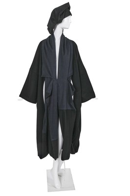 Lot 195 - A Comme des Garçons black cotton and wool ensemble, '‘Twist, Silk + Jersey, Knits (Patchworks)’ collection', Autumn-Winter 1984-85