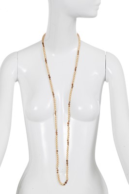 Lot 58 - A Gabrielle Chanel haute couture by Gripoix glass bead and faux pearl sautoir, 1970s