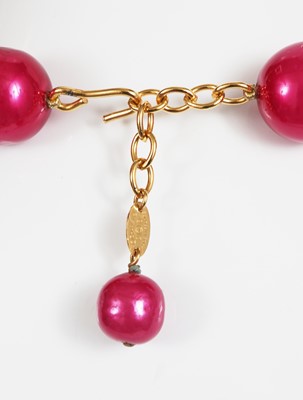 Lot 43 - A Chanel by Karl Lagerfeld fuchsia beaded necklace, 'Nouveau Rapper (Hip Hop)' collection, Autumn-Winter 1991-92