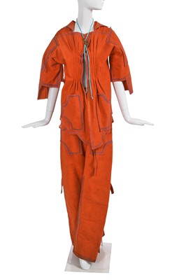 Lot 413 - A Zandra Rhodes orange Ultrasuede 'Ultrasuede Cowboy' ensemble, 'Cactus and Cowboy' collection, Spring-Summer 1976