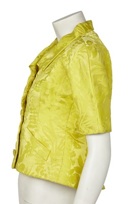 Lot 630 - An Hubert de Givenchy haute couture bright yellow damask satin jacket, circa 1963