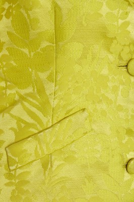 Lot 630 - An Hubert de Givenchy haute couture bright yellow damask satin jacket, circa 1963