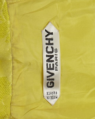 Lot 630 - An Hubert de Givenchy haute couture bright yellow damask satin jacket, circa 1963