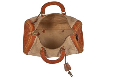 Lot 94 - Two Hermès canvas and leather travel/overnight bags, 1960s