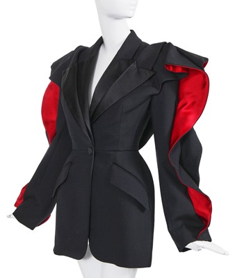 Lot 100 - An Alexander McQueen by Sarah Burton red and black wool and silk jacket, Autumn-Winter 2020-21
