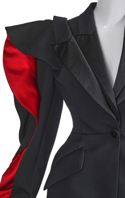 Lot 100 - An Alexander McQueen by Sarah Burton red and black wool and silk jacket, Autumn-Winter 2020-21